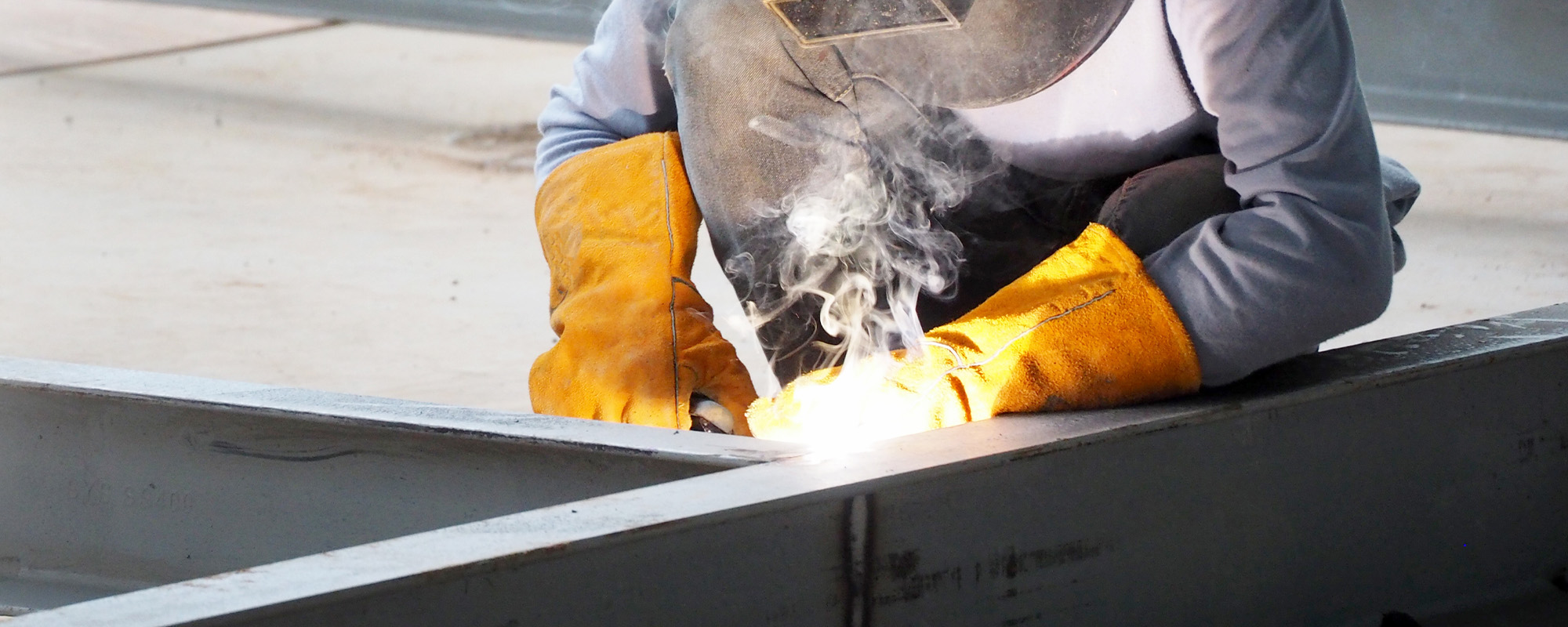 welding work worker with protective welding metal on construction
