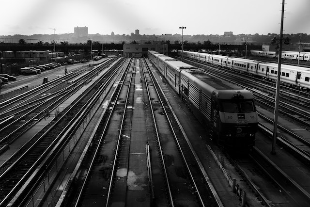 black and white rail road tracks