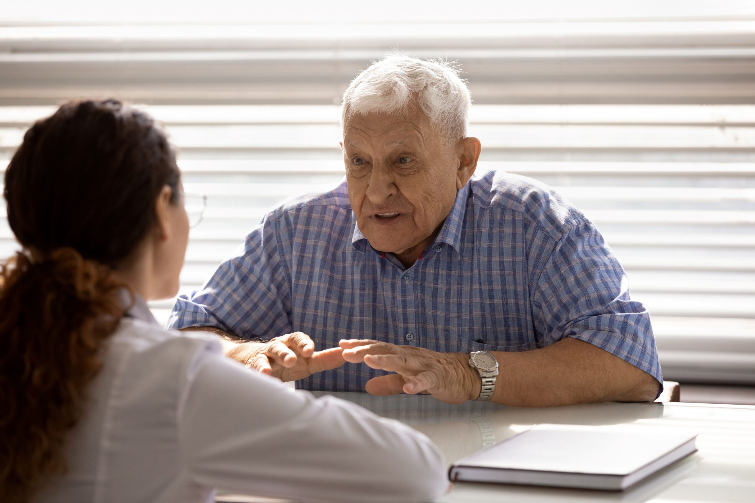 patient speaking with physician