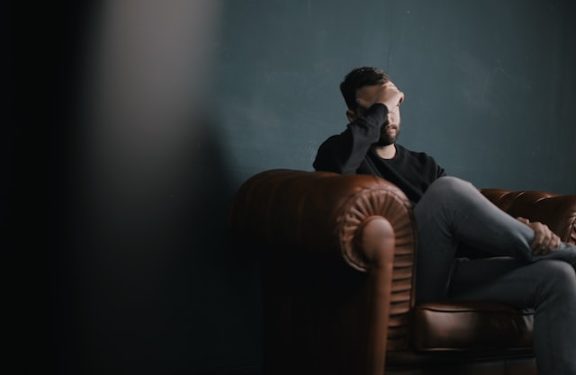 upset man on couch