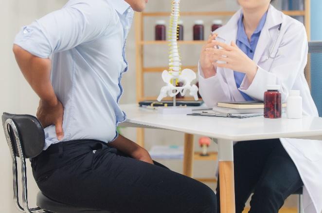 person receiving medical care from a doctor