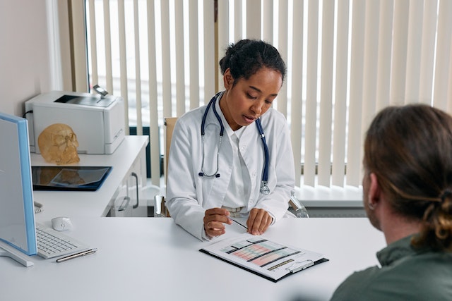 person meeting with doctor