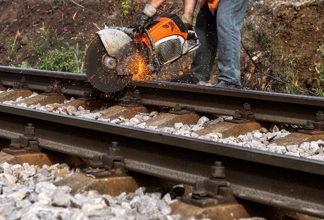 track worker on railroad