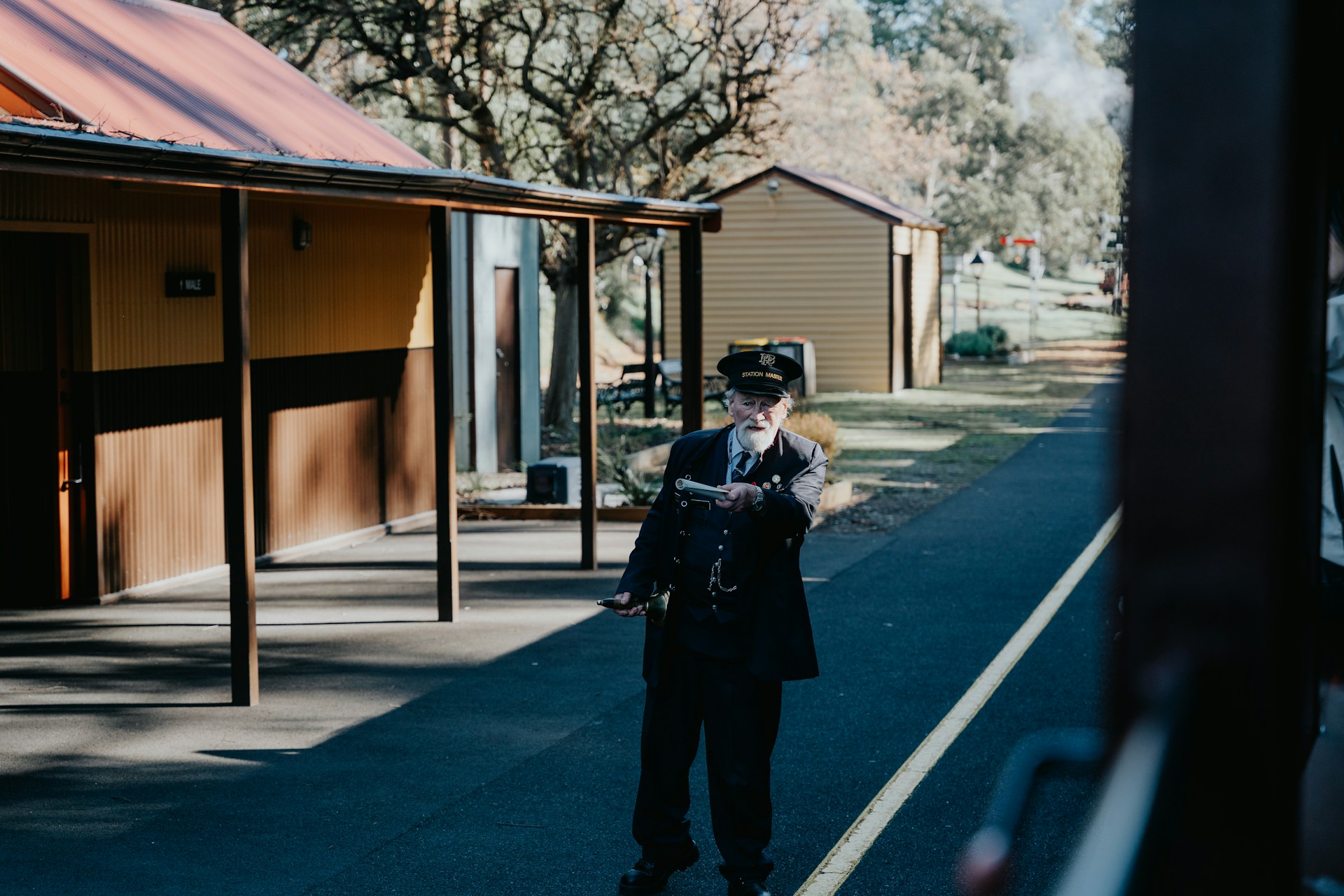 man in a train conductor uniform